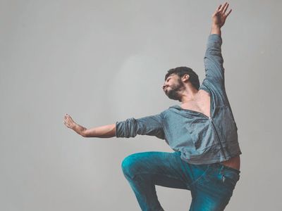 Person doing dynamic movements in a studio